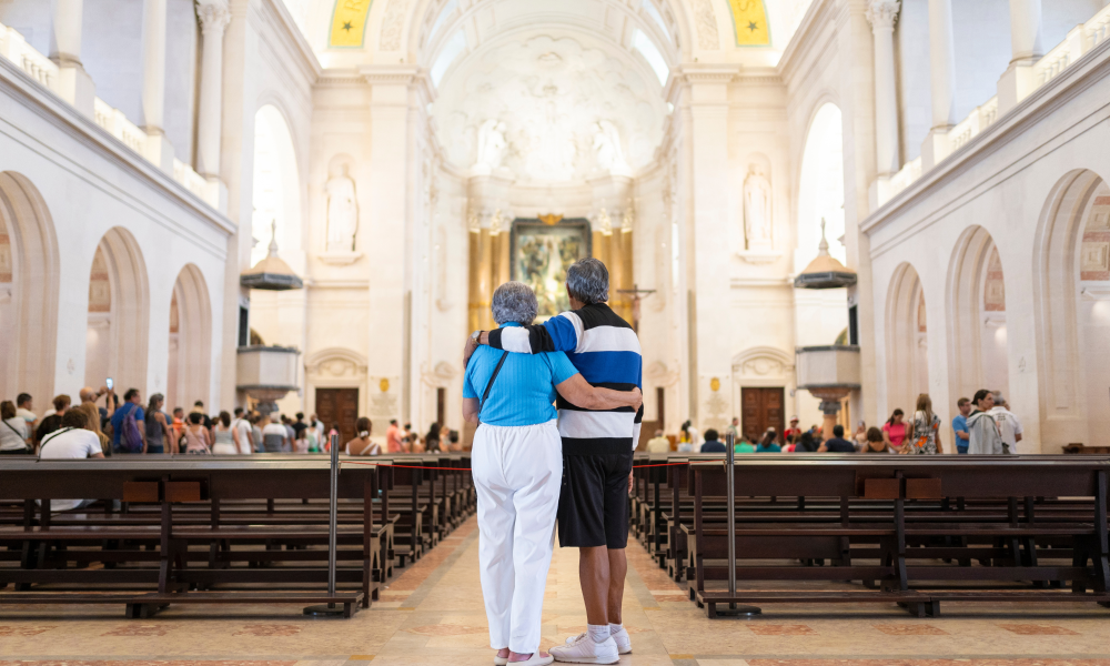 Older couple standing in a church