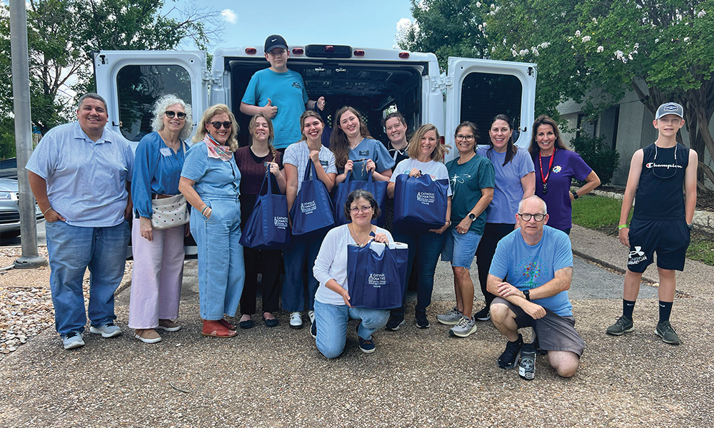 Catholic Charities continues to help survivors of last year’s floods 4