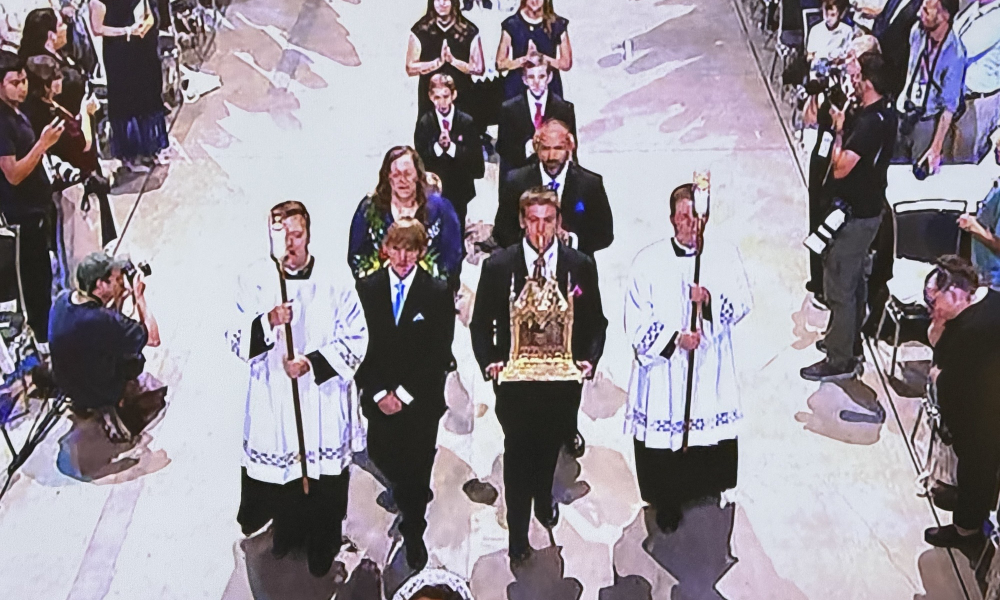 James Fulton Engstrom brought forth the relics of Archbishop Fulton Sheen during the Mass of Beatification. (Image from livestream of Mass)