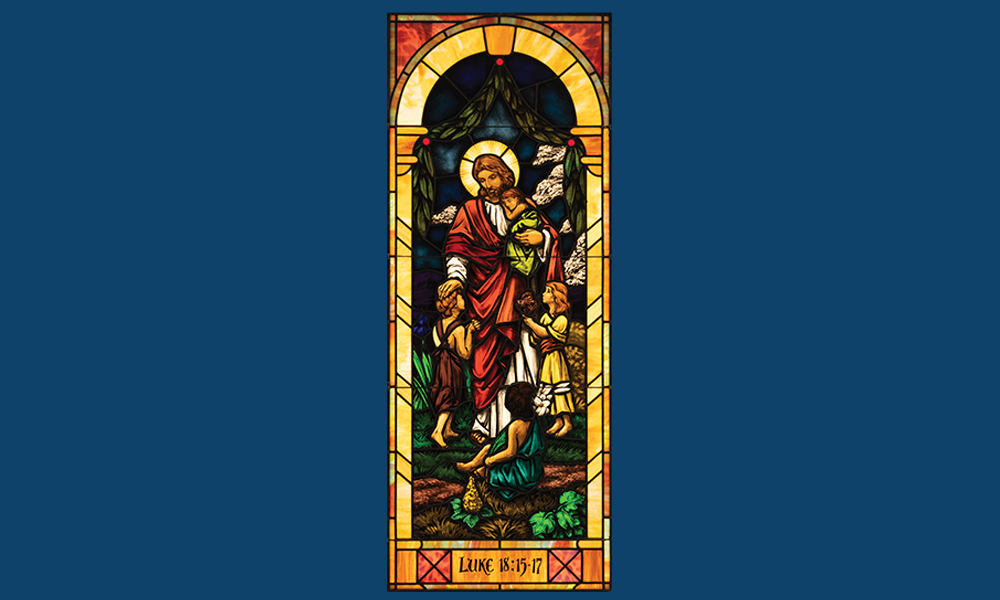 Jesús en el Evangelio de Lucas representado en un vitral en San José Parish en Austin.